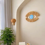 Oeil mural bleu pâle en fibres naturelles, pour un décor zen et protecteur