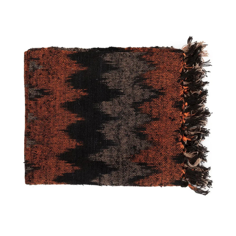 Plaid en coton tissé noir et orange motif géométrique avec franges
