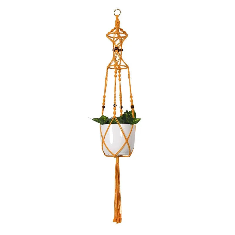 Support de plante en macramé orange avec plante en pot suspendue décoration intérieure