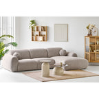 Canapé sectionnel en tissu beige texturé avec accoudoirs ronds