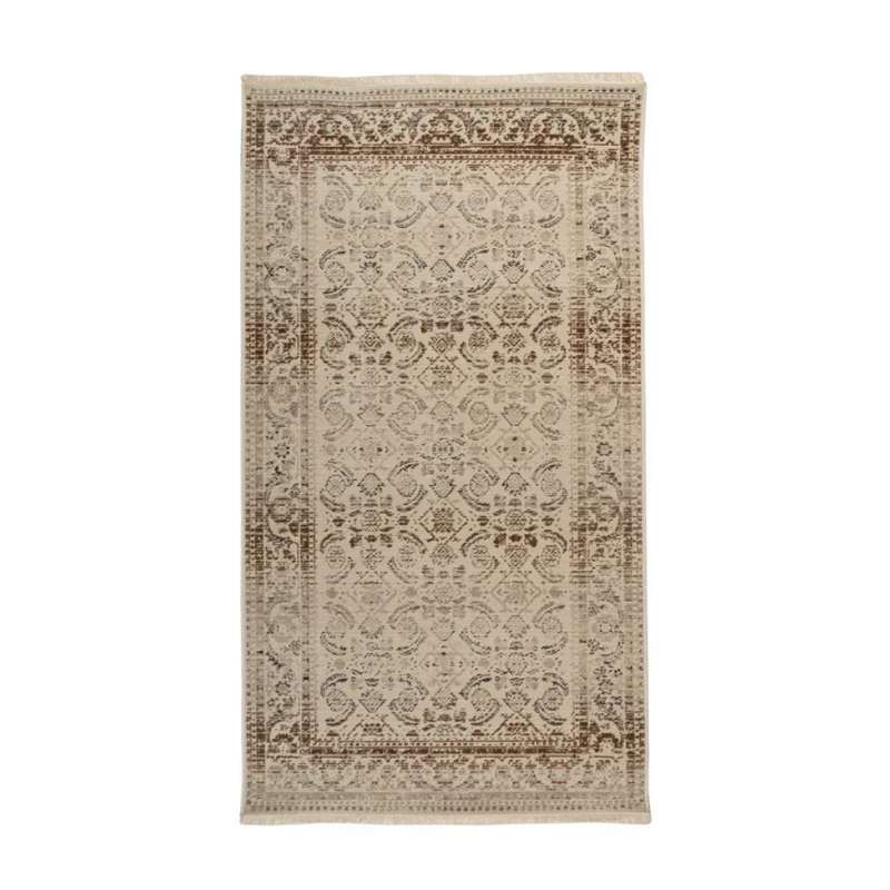 Tapis oriental rectangulaire beige à effet vieilli