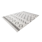 Tapis berbère rectangulaire avec motifs losanges noirs et franges en coton mélangé