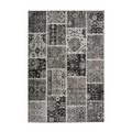 Tapis rectangulaire patchwork oriental gris et noir avec motifs traditionnels et usés